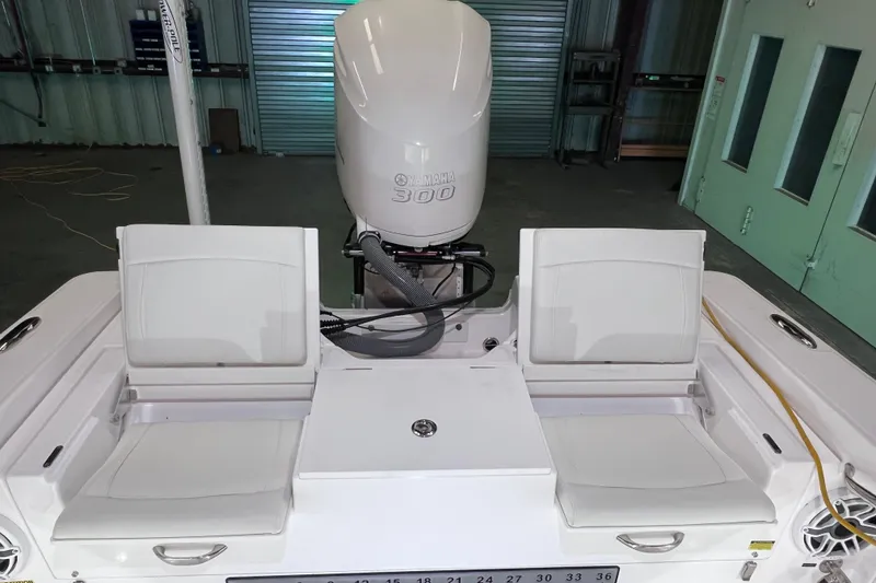 Slide: The Image of 2021 Everglades 253 Center Console boat with Yamaha 300 engine, featuring dual seating. - 20