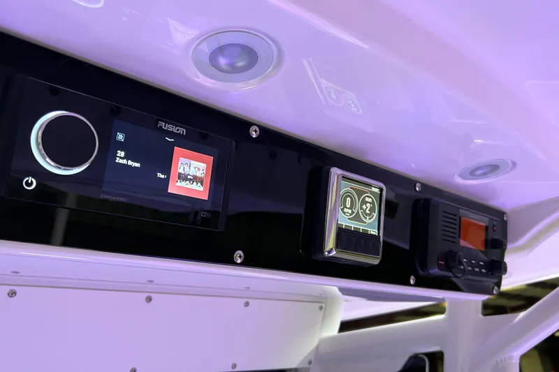 Slide: The Image of Control panel of 2021 Everglades 253 Center Console boat with modern displays. - 48