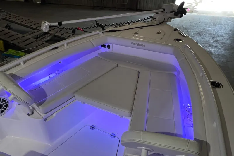 Slide: The Image of 2021 Everglades 253 Center Console boat interior with blue LED lighting. - 51