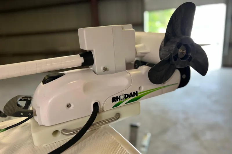 Slide: The Image of Close-up of a Rhodan trolling motor on a 2021 Everglades 253 Center Console boat. - 55