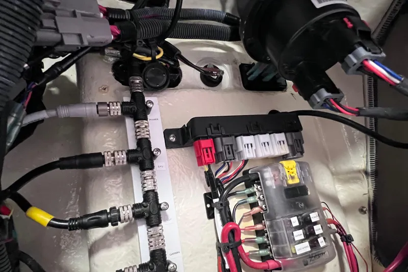 Slide: The Image of Electrical wiring and components inside a 2021 Everglades 253 Center Console boat. - 70