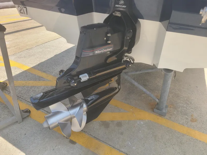 Slide: The Image of 2020 Sea Ray SPX 230 boat with MerCruiser outboard engine on display. - 9