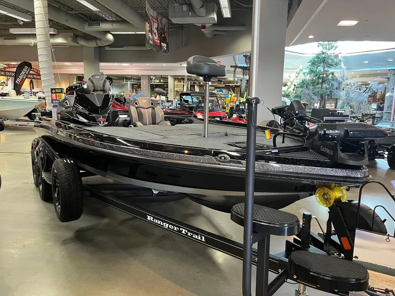 The Image of 2025 Ranger Z520R Cup-Equipped boat displayed indoors, featuring advanced Garmin technology. - 0