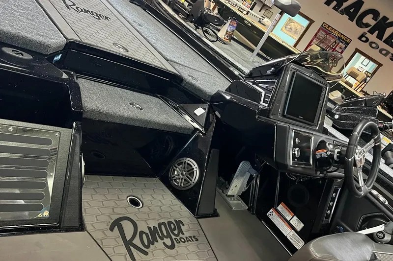 Slide: The Image of 2025 Ranger Z520R Cup-Equipped boat interior with advanced dashboard and seating. - 6