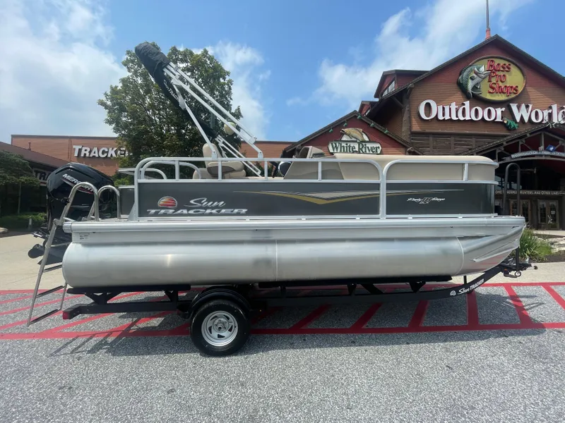 The Image of 2025 Sun Tracker Party Barge 18 DLX pontoon boat at Bass Pro Shops Outdoor World. - 0