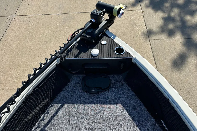 Slide: The Image of 2025 Ranger VS1882SC Angler boat bow with trolling motor and carpeted deck. - 3