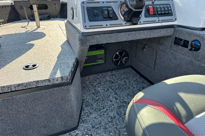 Slide: The Image of 2025 Ranger VS1882SC Angler boat interior with control panel and seating. - 6