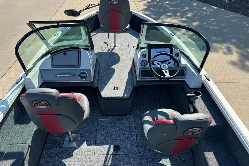 Slide: The Image of 2025 Ranger VS1882SC Angler boat interior with steering console and seating. - 7