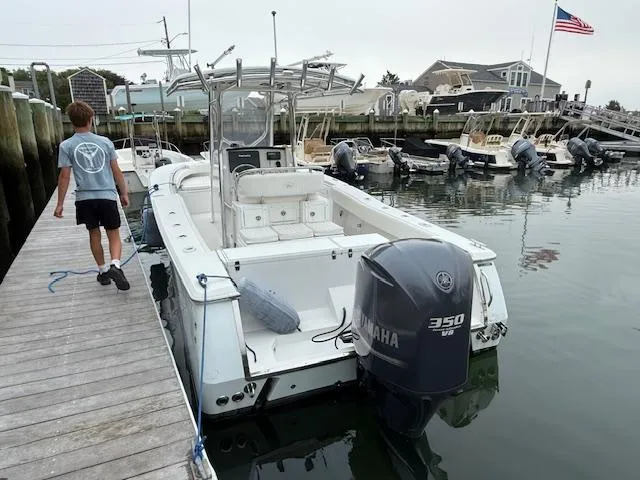 Slide: The Image of 2008 Southport 26 Center Console boat docked with Yamaha 350 engine. - 4