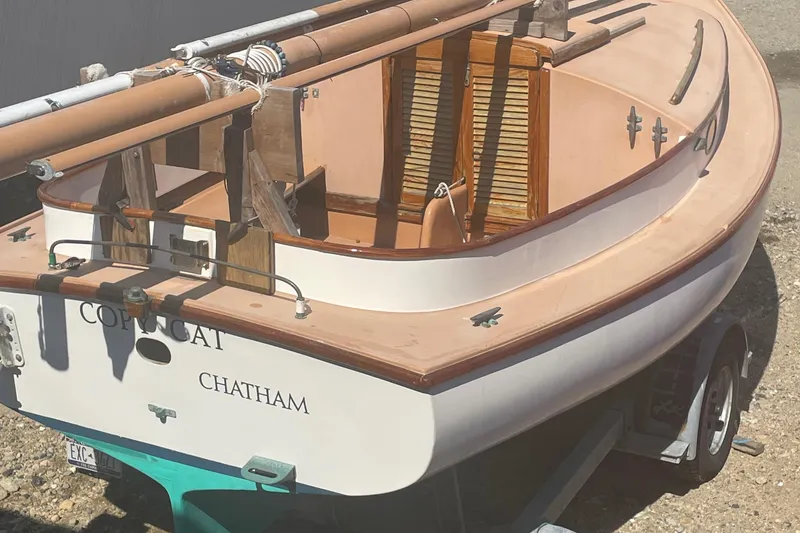 Slide: The Image of 1978 Marshall Sanderling sailboat named "Copy Cat" on a trailer in Chatham. - 5