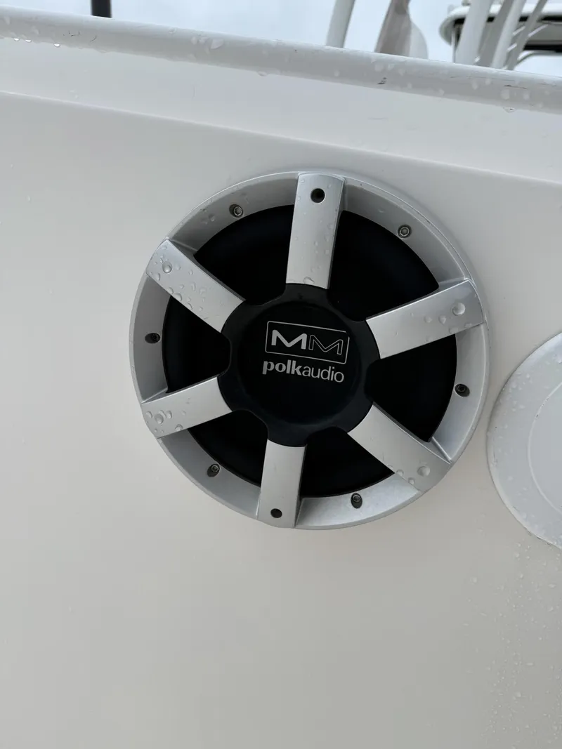 Slide: The Image of Polk Audio speaker on 2015 Edgewater 280CC boat, close-up view. - 16