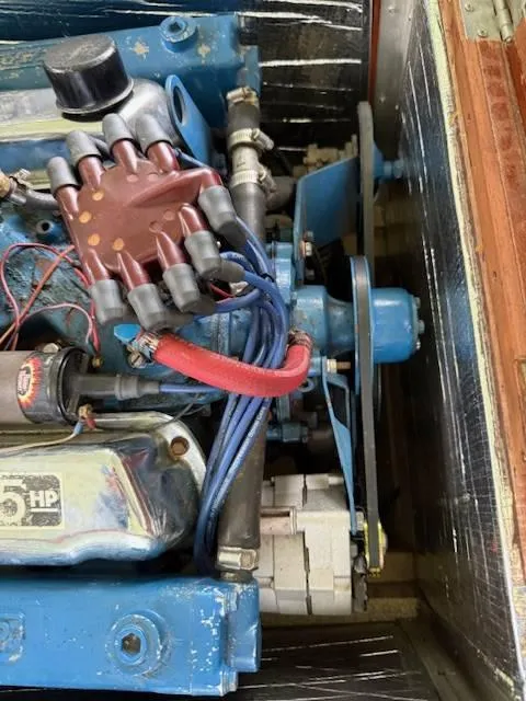 Slide: The Image of 1968 Lyman 19 engine close-up, showcasing wiring and components. - 21