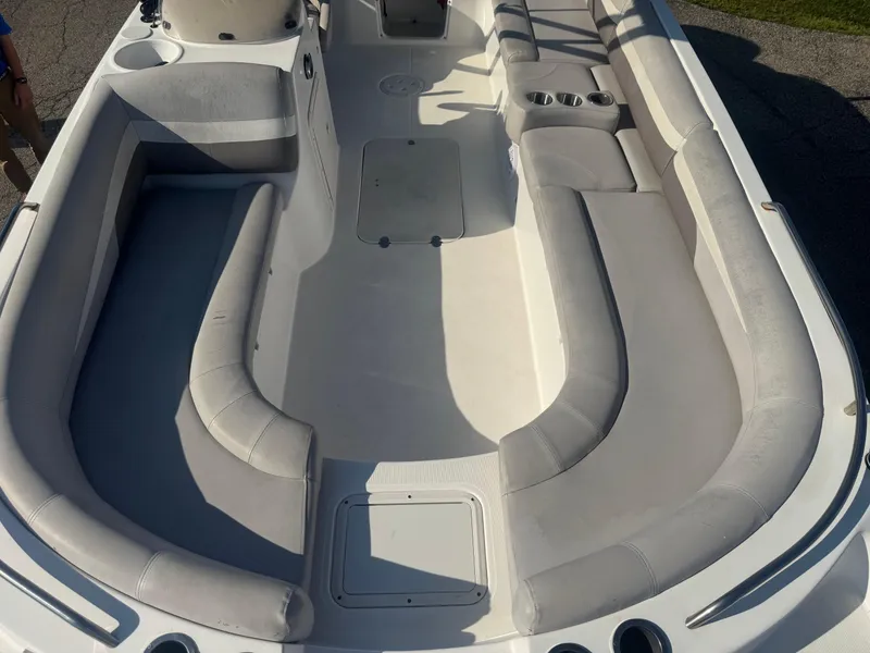 Slide: The Image of 2017 Hurricane SunDeck Sport 201 OB boat interior with spacious seating and cup holders. - 2