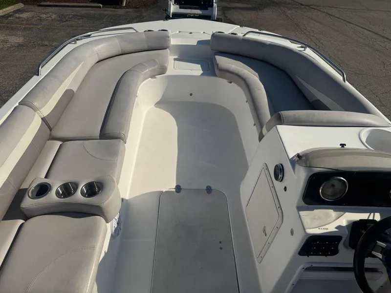 Slide: The Image of 2017 Hurricane SunDeck Sport 201 OB boat interior with spacious seating and cup holders. - 5