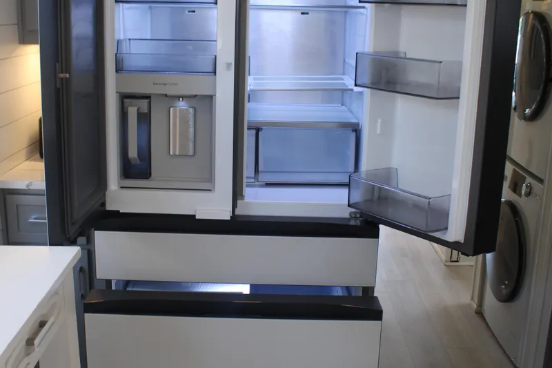 Slide: The Image of Wooden pull-out drawers in a modern kitchen cabinet, Sumerset 66, 1992 model. - 14