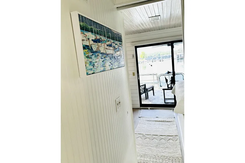 Slide: The Image of Modern kitchen refrigerator with open doors and spacious interior storage. - 17