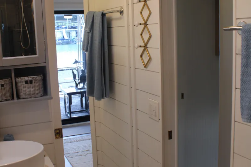 Slide: The Image of Modern black-tiled shower in 1992 Sumerset 66 houseboat bathroom. - 25