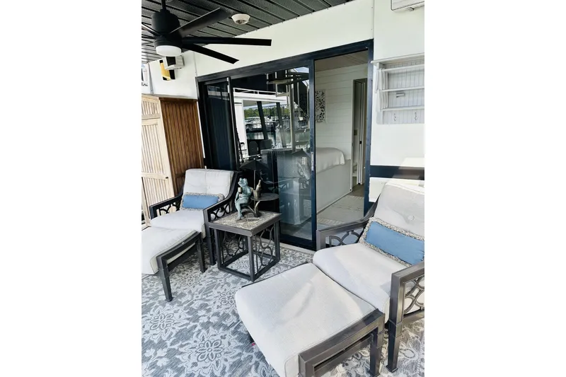 Slide: The Image of Interior of 1992 Sumerset 66 houseboat with modern bathroom and decorative cabinet. - 33