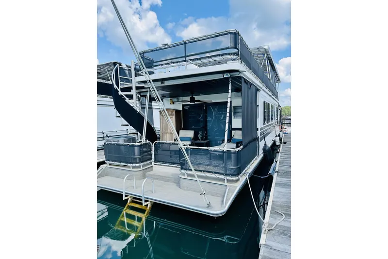 Slide: The Image of Cozy outdoor seating on 1992 Sumerset 66 houseboat with water view. - 39