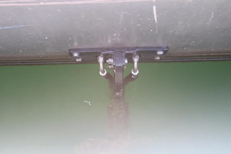 Slide: The Image of Surfboard on 1992 Sumerset 66 houseboat deck, docked by a lake. - 51