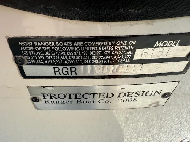 Slide: The Image of Ranger 618 T boat model plate with patent information and protected design label, 2011. - 4