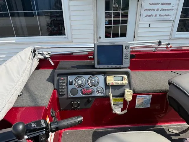 Slide: The Image of 2011 Ranger 618 T boat dashboard with navigation equipment and controls. - 5