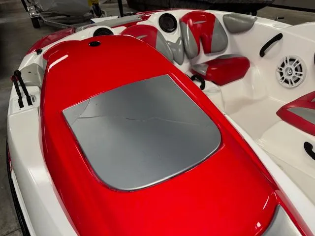 Slide: The Image of 2008 Sea-Doo 150 Speedster boat interior with red and gray seating, showcasing sleek design. - 15