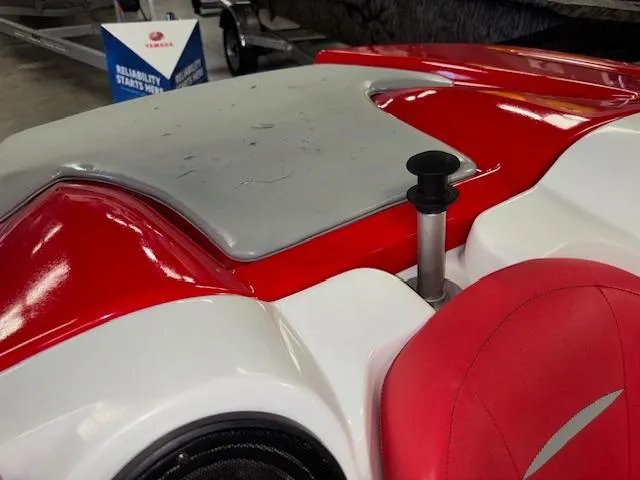 Slide: The Image of 2008 Sea-Doo 150 Speedster boat interior with red and white seating. - 16