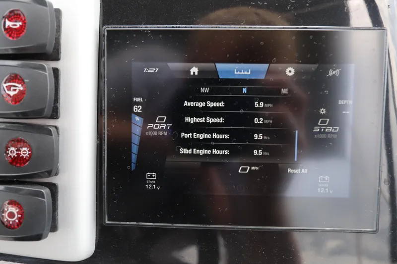 Slide: The Image of 2024 Yamaha Boats SX220 dashboard display showing speed, fuel, and engine hours. - 19