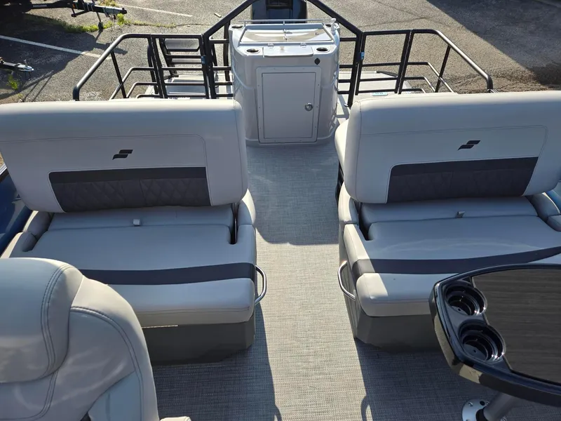 Slide: The Image of 2026 Starcraft CX23RL boat interior with plush seating and sleek design. - 7