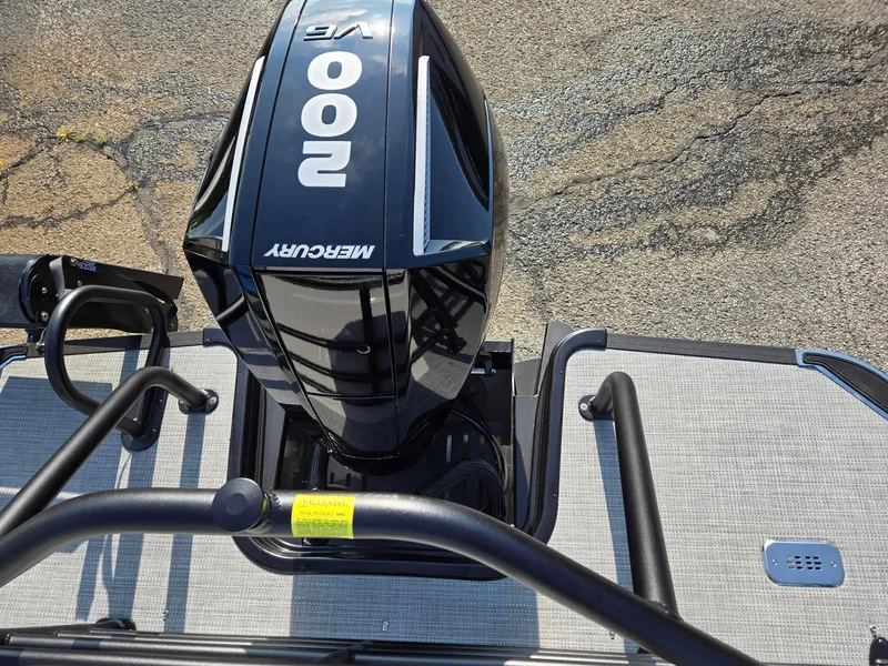 Slide: The Image of 2026 Starcraft CX23RL boat with Mercury 200 HP outboard motor, top view. - 9