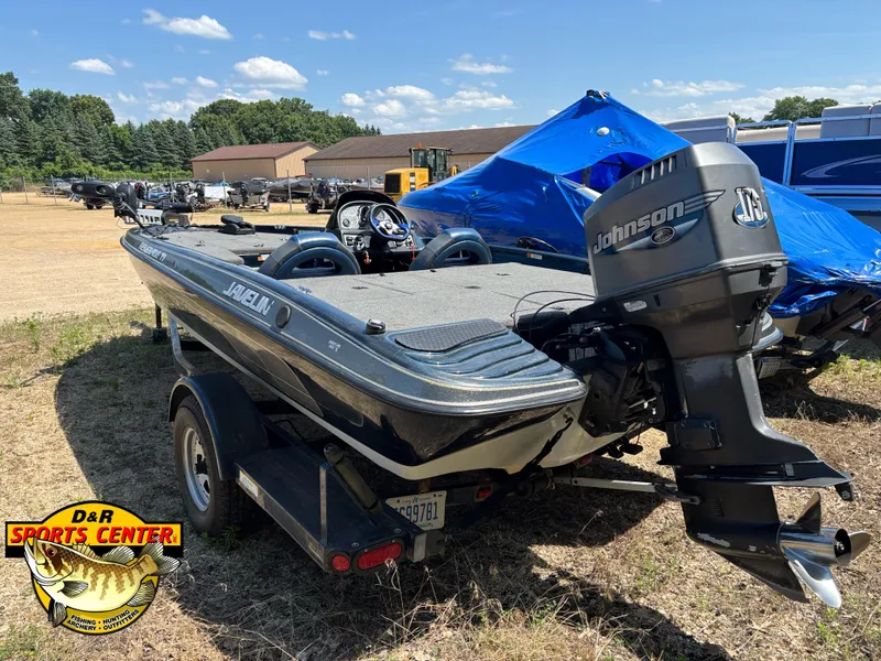 Slide: The Image of 1999 Javelin Renegade 19 SC boat with Johnson outboard motor at D&R Sports Center. - 17