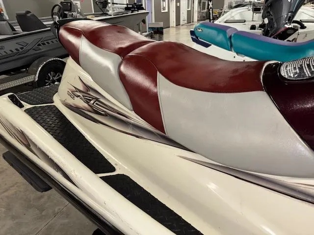 Slide: The Image of 2000 Yamaha WaveRunner XL 800 with red and white seat in showroom. - 7