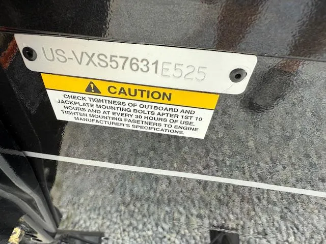 Slide: The Image of Caution label on 2026 Vexus AVX189 boat, advising bolt checks after specific hours of use. - 4