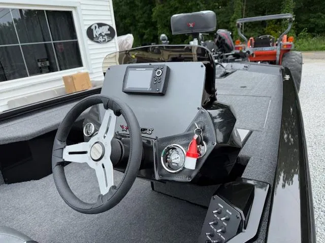Slide: The Image of 2026 Vexus AVX189 boat dashboard with steering wheel and navigation system. - 5