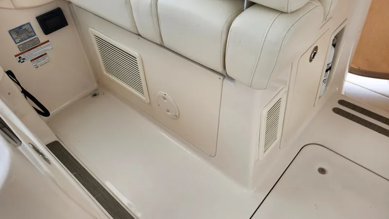 Slide: The Image of Interior seating area of a 2021 Grady-White Freedom 335 boat. - 17