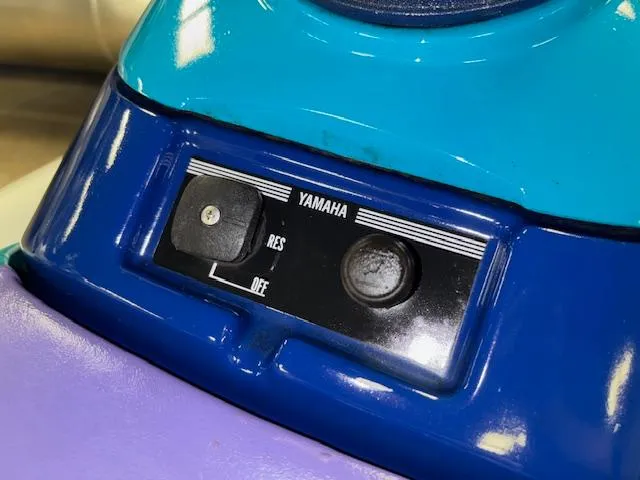 Slide: The Image of 1995 Yamaha WaveRunner Wave Venture control panel with RES and OFF switch. - 7