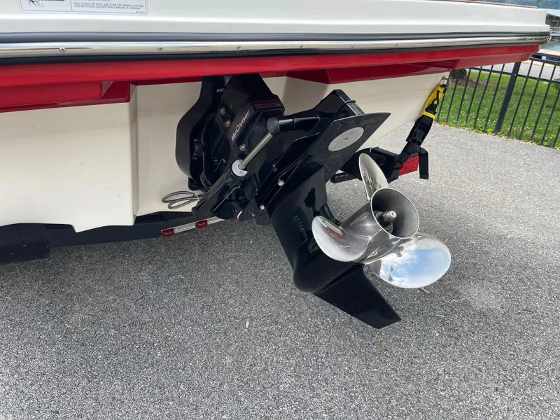 Slide: The Image of 2018 Sea Ray SPX 210 boat with MerCruiser outdrive and stainless steel propeller. - 3