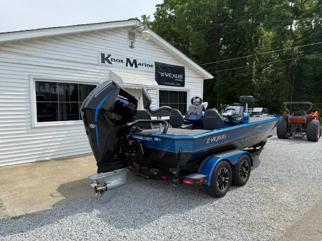 Slide: The Image of 2026 Vexus 2085s boat parked outside Knox Marine dealership. - 3