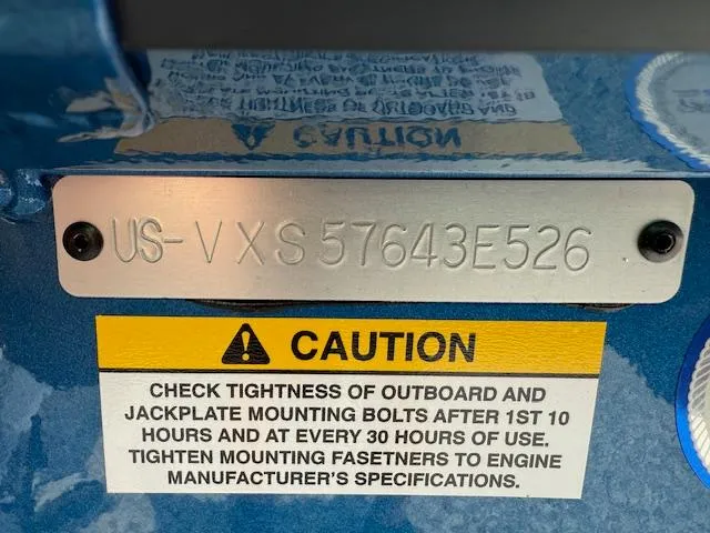 Slide: The Image of 2026 Vexus 2085s serial number plate with caution label for bolt maintenance. - 4