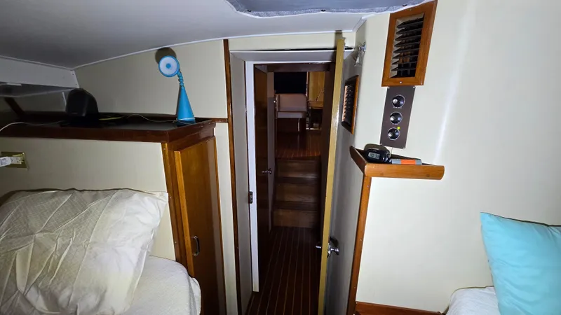Slide: The Image of Interior of 1979 Chris-Craft 360 Commander with wooden furnishings. - 13