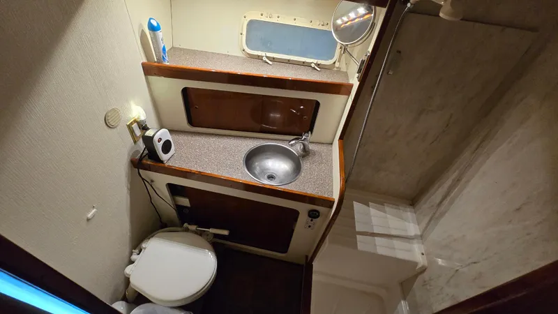 Slide: The Image of Interior view of 1979 Chris-Craft 360 Commander head compartment. - 14