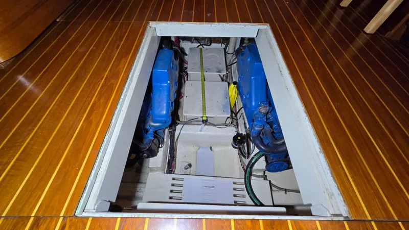 Slide: The Image of Engine compartment of 1979 Chris-Craft 360 Commander with wooden flooring. - 15