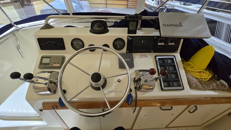 Slide: The Image of 1979 Chris-Craft 360 Commander helm with Garmin navigation. - 22