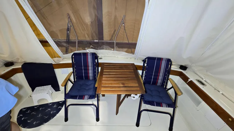 Slide: The Image of 1979 Chris-Craft 360 Commander interior with seating area. - 26