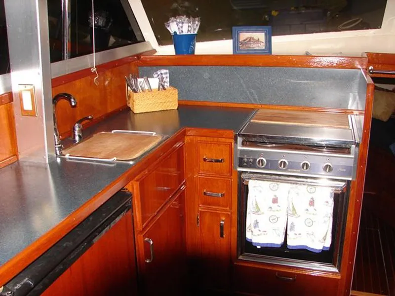 Slide: The Image of Interior of 1979 Chris-Craft 360 Commander yacht kitchen. - 8