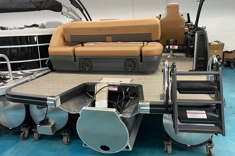 Slide: The Image of 2025 Bennington 22 M CRUISE pontoon boat with tan seating and modern design. - 2