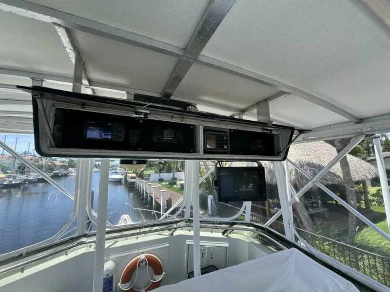 Slide: The Image of Interior view of 1989 Hatteras 42 Convertible yacht with navigation equipment. - 20