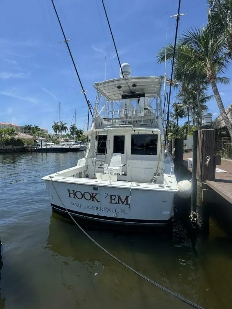 Slide: The Image of 1989 Hatteras 42 Convertible boat docked in Fort Lauderdale marina. - 3
