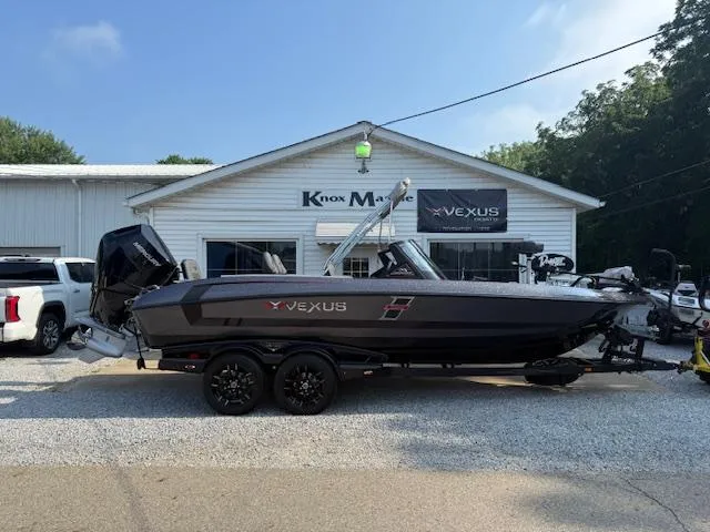 The Image of 2026 Vexus DVX22S boat on trailer outside Knox Marine dealership. - 1